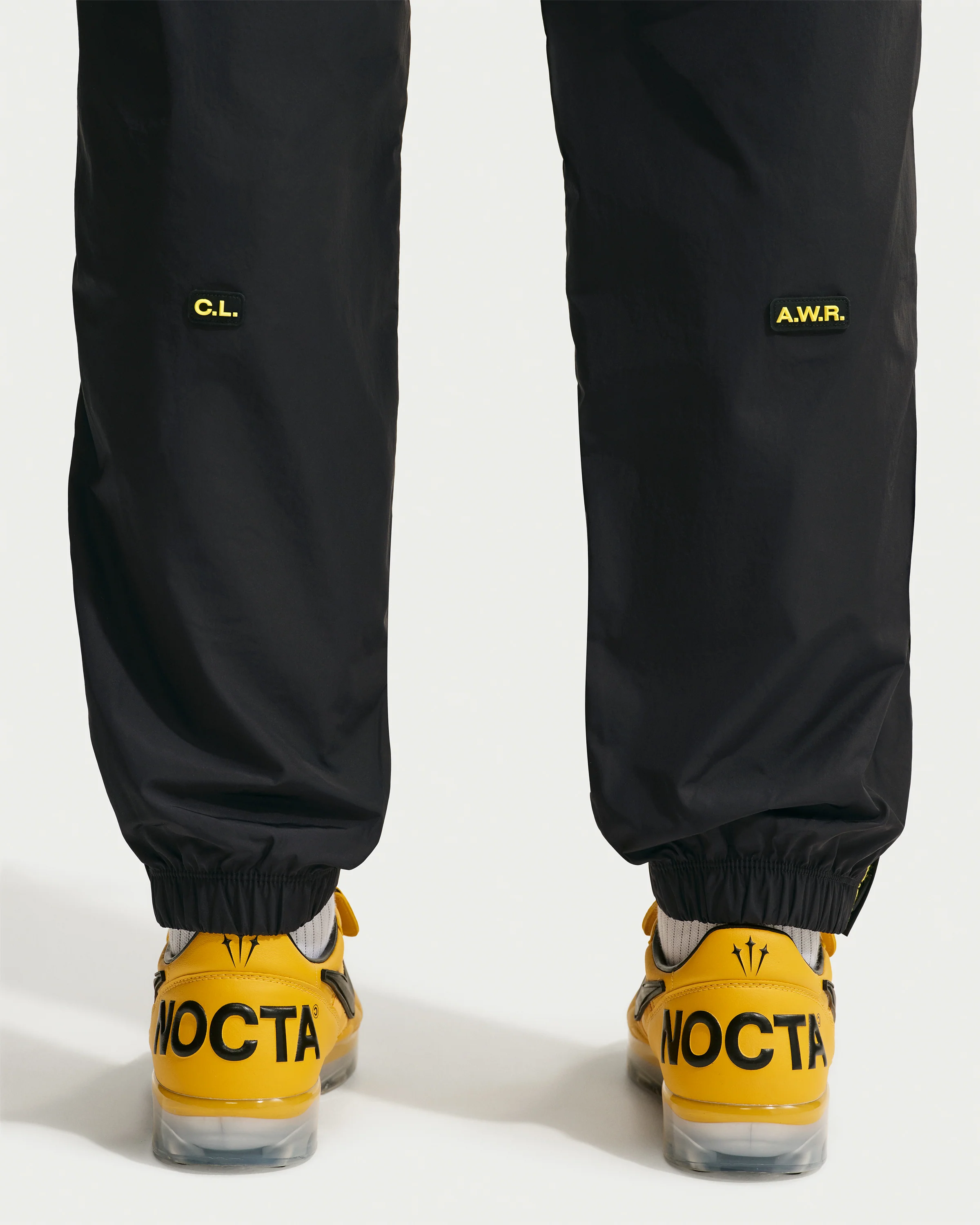 NIKE X NOCTA CA TRACK PANT - BLACK/ GYM RED - Image 4