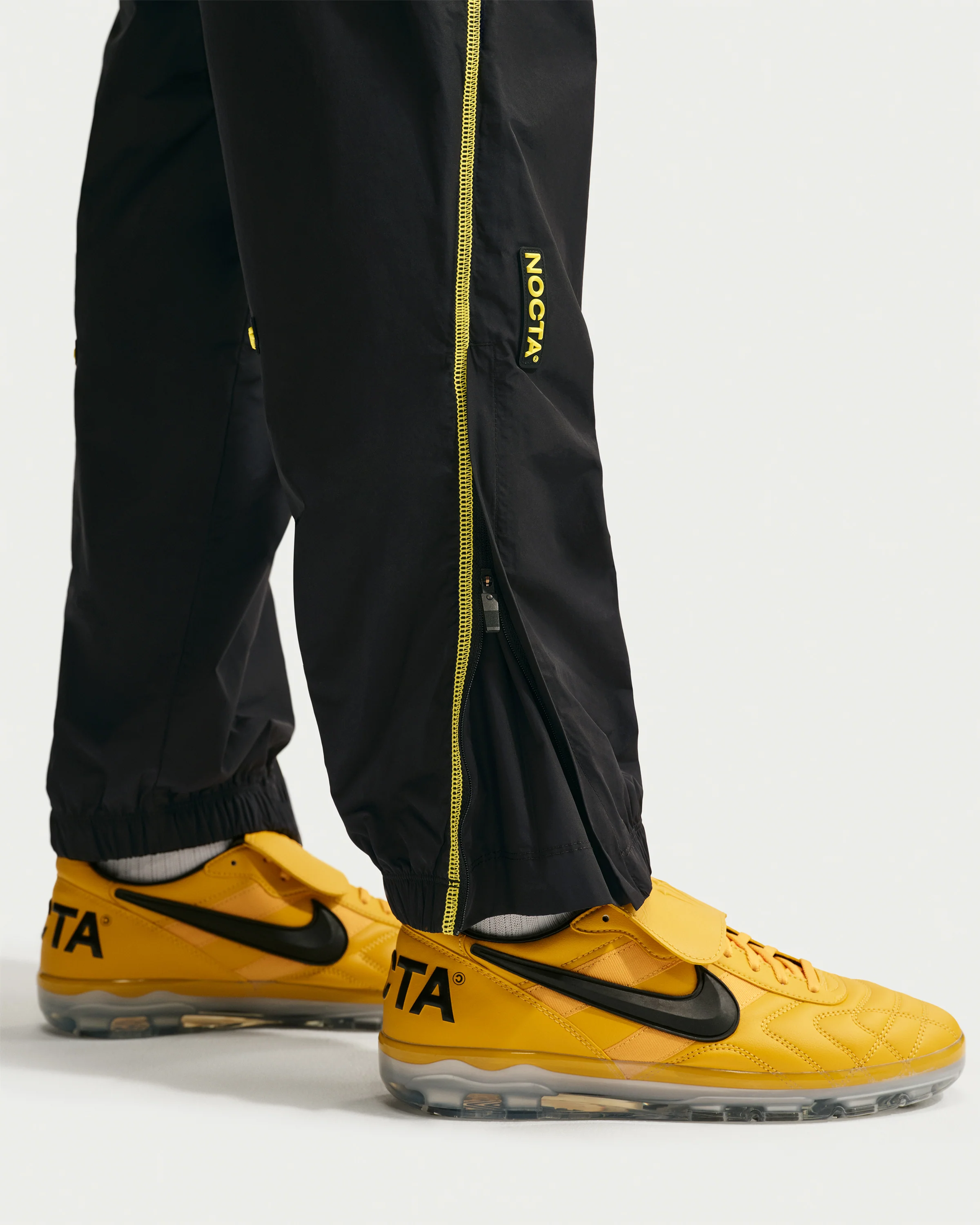 NIKE X NOCTA CA TRACK PANT - BLACK/ GYM RED - Image 5